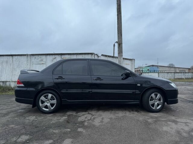 Чорний Міцубісі Lancer, об'ємом двигуна 1.6 л та пробігом 154 тис. км за 5500 $, фото 5 на Automoto.ua