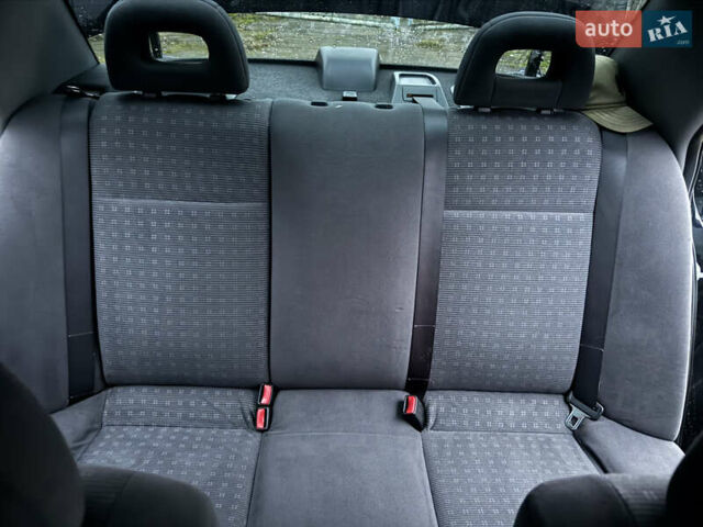 Черный Мицубиси Лансер, объемом двигателя 1.58 л и пробегом 154 тыс. км за 5500 $, фото 36 на Automoto.ua