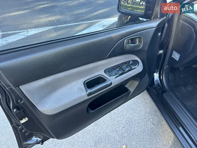 Мицубиси Лансер 2005 в Виннице на Automoto.ua Черный Мицубиси Лансер, объемом двигателя 1.6 л и пробегом 261 тыс. км за 4100 $, фото 32 на Automoto.ua