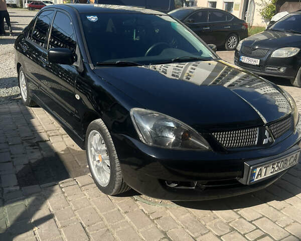 Мицубиси Лансер 2005 в Ивано-Франковске на Automoto.ua Черный Мицубиси Лансер, объемом двигателя 1.58 л и пробегом 250 тыс. км за 5000 $, фото 1 на Automoto.ua