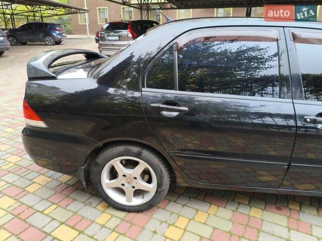 Мицубиси Лансер 2005 в Одессе на Automoto.ua Черный Мицубиси Лансер, объемом двигателя 1.58 л и пробегом 206 тыс. км за 3900 $, фото 5 на Automoto.ua
