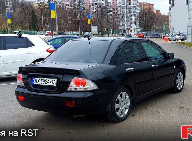 Чорний Міцубісі Lancer, об'ємом двигуна 1.6 л та пробігом 1 тис. км за 3999 $, фото 4 на Automoto.ua