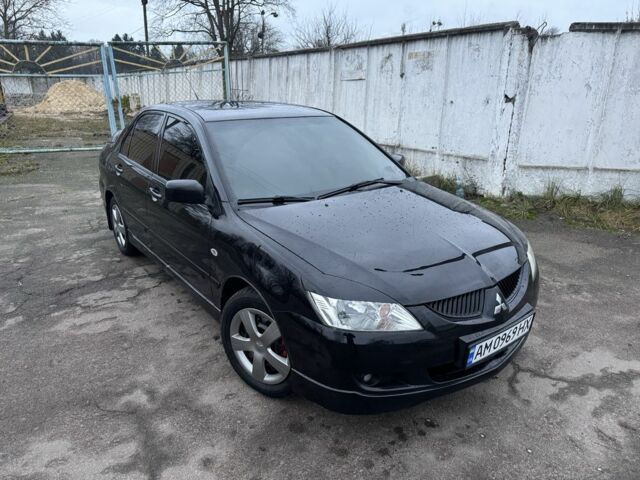 Чорний Міцубісі Lancer, об'ємом двигуна 1.6 л та пробігом 154 тис. км за 5500 $, фото 1 на Automoto.ua