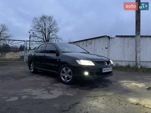 Черный Мицубиси Лансер, объемом двигателя 1.58 л и пробегом 154 тыс. км за 5500 $, фото 42 на Automoto.ua