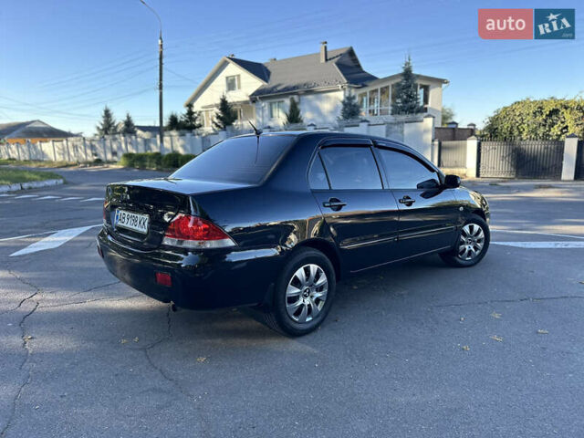 Мицубиси Лансер 2005 в Виннице на Automoto.ua Черный Мицубиси Лансер, объемом двигателя 1.6 л и пробегом 261 тыс. км за 4100 $, фото 11 на Automoto.ua