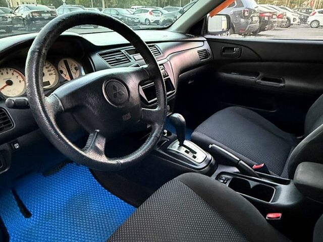 Чорний Міцубісі Lancer, об'ємом двигуна 1.6 л та пробігом 195 тис. км за 3999 $, фото 6 на Automoto.ua