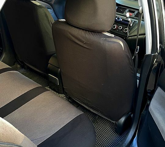 Черный Мицубиси Лансер, объемом двигателя 1.6 л и пробегом 200 тыс. км за 3000 $, фото 5 на Automoto.ua