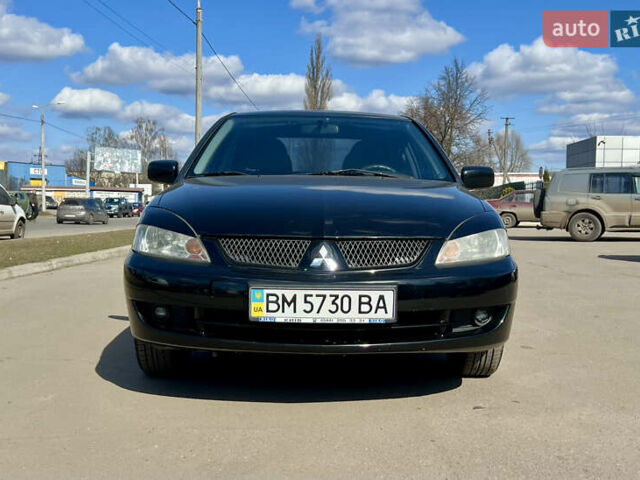 Черный Мицубиси Лансер, объемом двигателя 1.58 л и пробегом 172 тыс. км за 4150 $, фото 1 на Automoto.ua