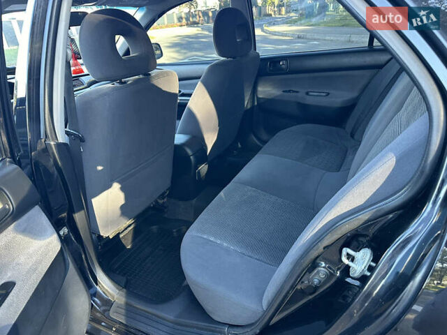 Мицубиси Лансер 2005 в Виннице на Automoto.ua Черный Мицубиси Лансер, объемом двигателя 1.6 л и пробегом 261 тыс. км за 4100 $, фото 39 на Automoto.ua