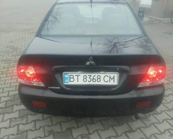 Чорний Міцубісі Lancer, об'ємом двигуна 1.6 л та пробігом 275 тис. км за 2999 $, фото 19 на Automoto.ua