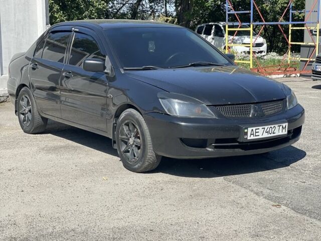 Чорний Міцубісі Lancer, об'ємом двигуна 1.6 л та пробігом 320 тис. км за 3599 $, фото 2 на Automoto.ua