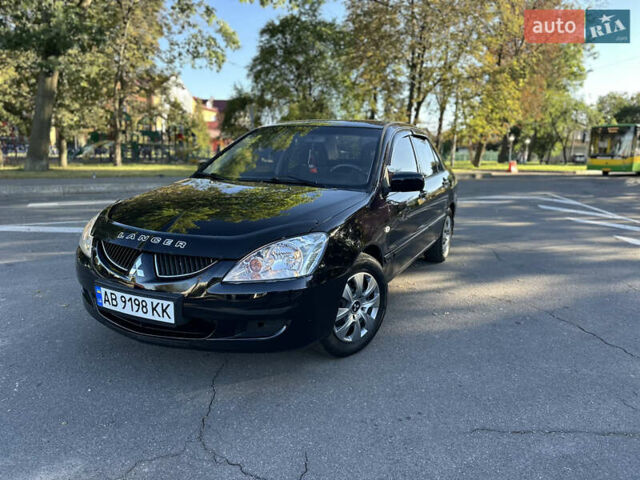 Мицубиси Лансер 2005 в Виннице на Automoto.ua Черный Мицубиси Лансер, объемом двигателя 1.6 л и пробегом 261 тыс. км за 4100 $, фото 1 на Automoto.ua