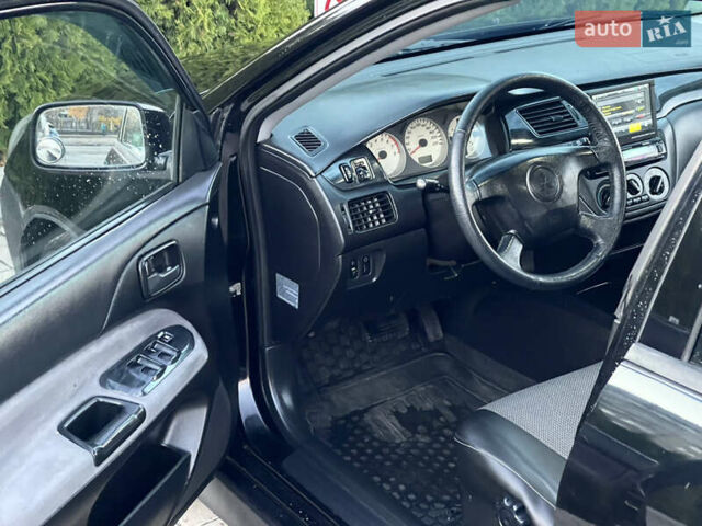 Мицубиси Лансер 2005 в Черкассах на Automoto.ua Черный Мицубиси Лансер, объемом двигателя 1.58 л и пробегом 368 тыс. км за 4400 $, фото 23 на Automoto.ua