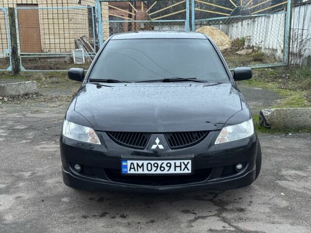 Чорний Міцубісі Lancer, об'ємом двигуна 1.6 л та пробігом 154 тис. км за 5500 $, фото 2 на Automoto.ua