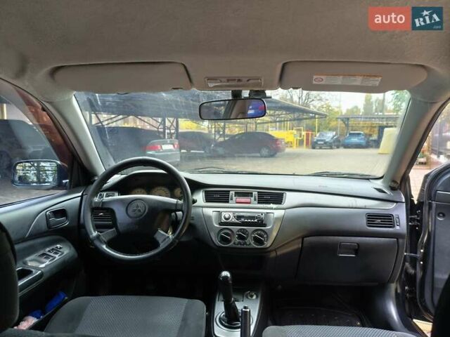 Мицубиси Лансер 2005 в Одессе на Automoto.ua Черный Мицубиси Лансер, объемом двигателя 1.58 л и пробегом 206 тыс. км за 3900 $, фото 15 на Automoto.ua