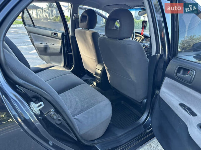 Мицубиси Лансер 2005 в Виннице на Automoto.ua Черный Мицубиси Лансер, объемом двигателя 1.6 л и пробегом 261 тыс. км за 4100 $, фото 44 на Automoto.ua