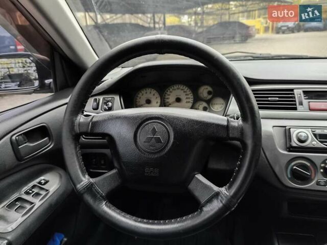 Мицубиси Лансер 2005 в Одессе на Automoto.ua Черный Мицубиси Лансер, объемом двигателя 1.58 л и пробегом 206 тыс. км за 3900 $, фото 18 на Automoto.ua