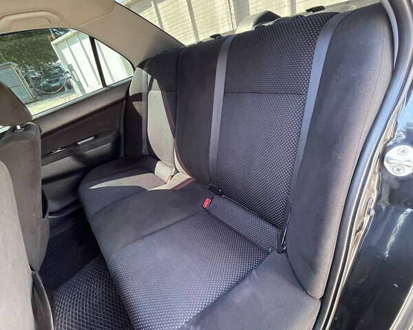 Чорний Міцубісі Lancer, об'ємом двигуна 1.58 л та пробігом 320 тис. км за 3600 $, фото 6 на Automoto.ua
