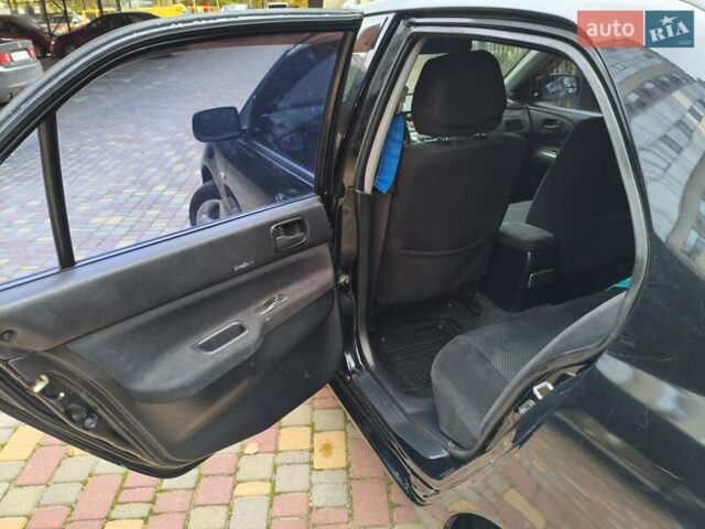 Мицубиси Лансер 2005 в Одессе на Automoto.ua Черный Мицубиси Лансер, объемом двигателя 1.58 л и пробегом 206 тыс. км за 3900 $, фото 14 на Automoto.ua