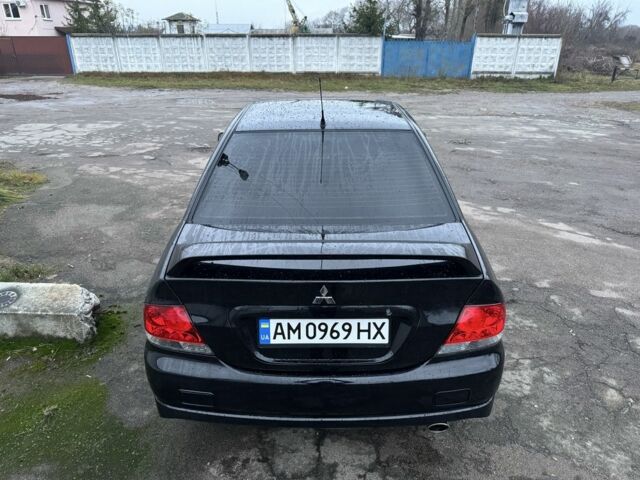 Чорний Міцубісі Lancer, об'ємом двигуна 1.6 л та пробігом 154 тис. км за 5500 $, фото 8 на Automoto.ua