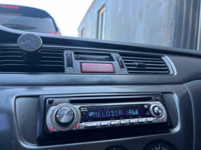 Чорний Міцубісі Lancer, об'ємом двигуна 2 л та пробігом 310 тис. км за 4990 $, фото 21 на Automoto.ua