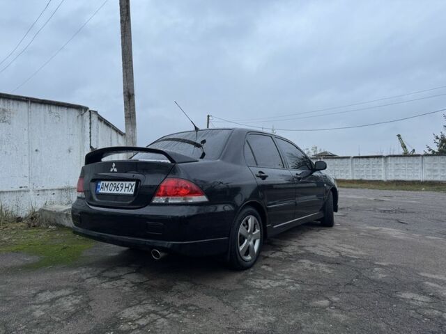 Чорний Міцубісі Lancer, об'ємом двигуна 1.6 л та пробігом 154 тис. км за 5500 $, фото 6 на Automoto.ua
