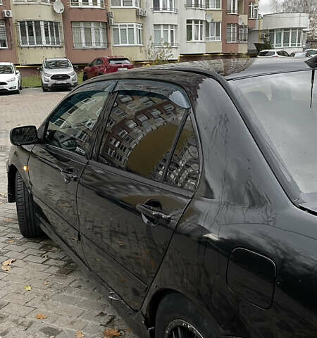 Черный Мицубиси Лансер, объемом двигателя 1.6 л и пробегом 200 тыс. км за 3000 $, фото 3 на Automoto.ua