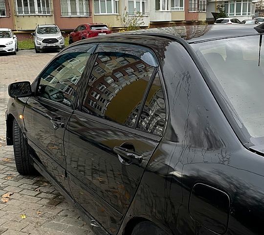 Черный Мицубиси Лансер, объемом двигателя 1.6 л и пробегом 200 тыс. км за 3000 $, фото 3 на Automoto.ua