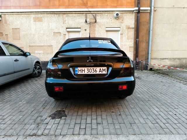 Чорний Міцубісі Lancer, об'ємом двигуна 2 л та пробігом 261 тис. км за 2700 $, фото 2 на Automoto.ua