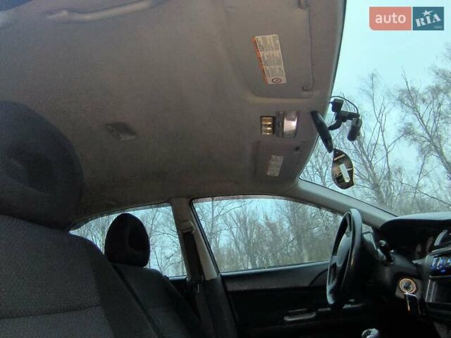 Чорний Міцубісі Lancer, об'ємом двигуна 1.58 л та пробігом 263 тис. км за 4500 $, фото 8 на Automoto.ua