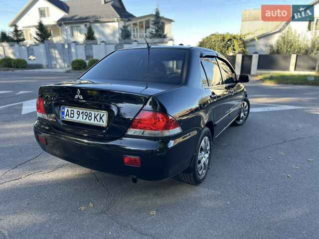 Мицубиси Лансер 2005 в Виннице на Automoto.ua Черный Мицубиси Лансер, объемом двигателя 1.6 л и пробегом 261 тыс. км за 4100 $, фото 10 на Automoto.ua