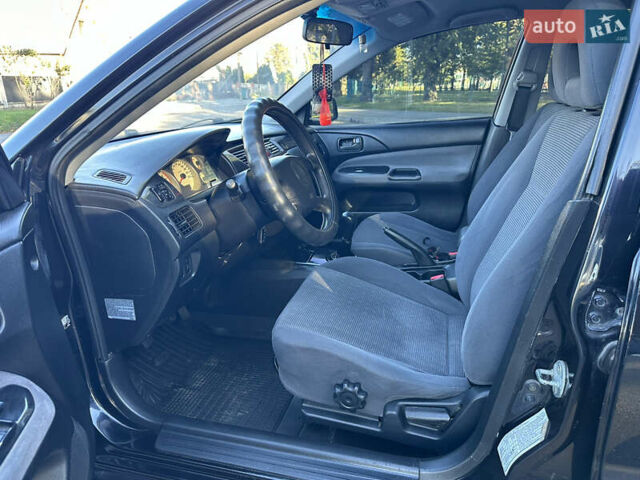 Мицубиси Лансер 2005 в Виннице на Automoto.ua Черный Мицубиси Лансер, объемом двигателя 1.6 л и пробегом 261 тыс. км за 4100 $, фото 35 на Automoto.ua