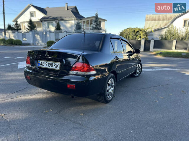 Мицубиси Лансер 2005 в Виннице на Automoto.ua Черный Мицубиси Лансер, объемом двигателя 1.6 л и пробегом 261 тыс. км за 4100 $, фото 8 на Automoto.ua
