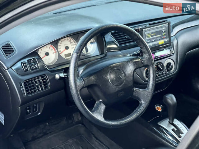 Мицубиси Лансер 2005 в Черкассах на Automoto.ua Черный Мицубиси Лансер, объемом двигателя 1.58 л и пробегом 368 тыс. км за 4400 $, фото 24 на Automoto.ua