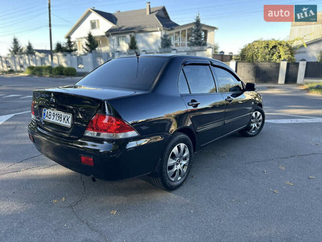 Мицубиси Лансер 2005 в Виннице на Automoto.ua Черный Мицубиси Лансер, объемом двигателя 1.6 л и пробегом 261 тыс. км за 4100 $, фото 12 на Automoto.ua