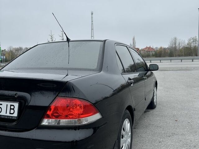 Черный Мицубиси Лансер, объемом двигателя 1.6 л и пробегом 200 тыс. км за 3500 $, фото 5 на Automoto.ua