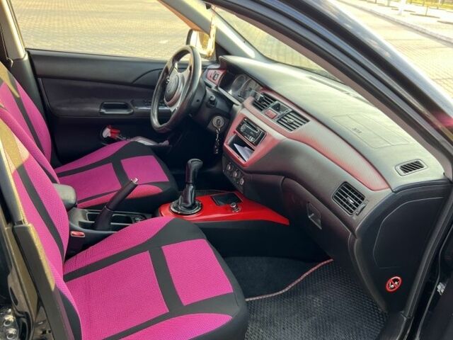 Чорний Міцубісі Lancer, об'ємом двигуна 2 л та пробігом 261 тис. км за 2700 $, фото 8 на Automoto.ua