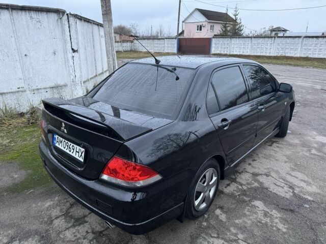 Чорний Міцубісі Lancer, об'ємом двигуна 1.6 л та пробігом 154 тис. км за 5500 $, фото 7 на Automoto.ua
