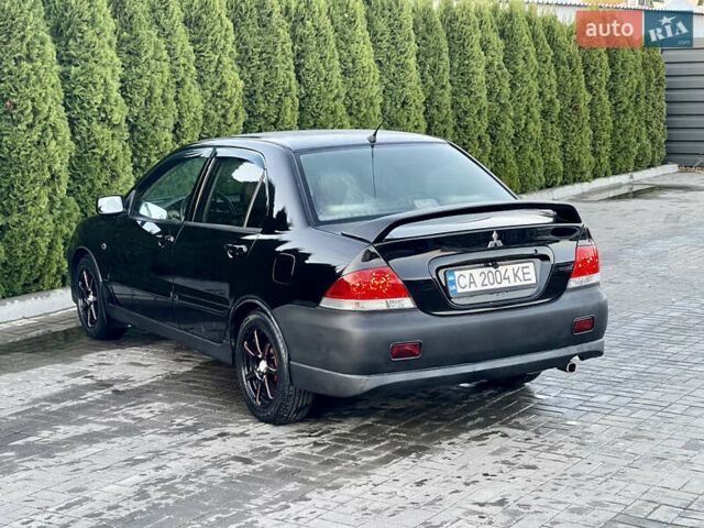 Мицубиси Лансер 2005 в Черкассах на Automoto.ua Черный Мицубиси Лансер, объемом двигателя 1.58 л и пробегом 368 тыс. км за 4400 $, фото 18 на Automoto.ua