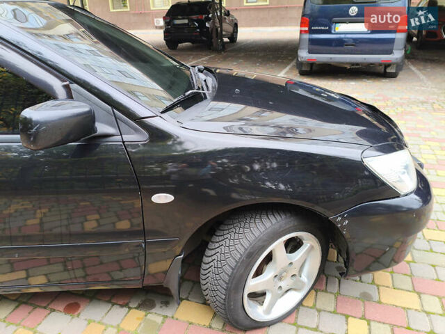 Мицубиси Лансер 2005 в Одессе на Automoto.ua Черный Мицубиси Лансер, объемом двигателя 1.58 л и пробегом 206 тыс. км за 3900 $, фото 7 на Automoto.ua