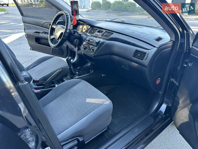 Мицубиси Лансер 2005 в Виннице на Automoto.ua Черный Мицубиси Лансер, объемом двигателя 1.6 л и пробегом 261 тыс. км за 4100 $, фото 51 на Automoto.ua