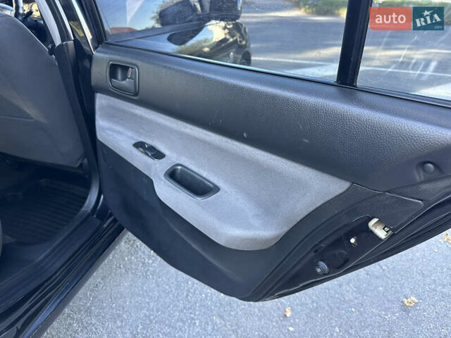 Мицубиси Лансер 2005 в Виннице на Automoto.ua Черный Мицубиси Лансер, объемом двигателя 1.6 л и пробегом 261 тыс. км за 4100 $, фото 46 на Automoto.ua