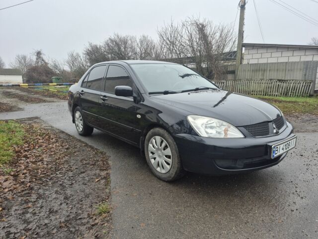 Черный Мицубиси Лансер, объемом двигателя 1.6 л и пробегом 280 тыс. км за 3200 $, фото 5 на Automoto.ua