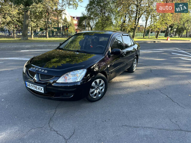 Мицубиси Лансер 2005 в Виннице на Automoto.ua Черный Мицубиси Лансер, объемом двигателя 1.6 л и пробегом 261 тыс. км за 4100 $, фото 5 на Automoto.ua