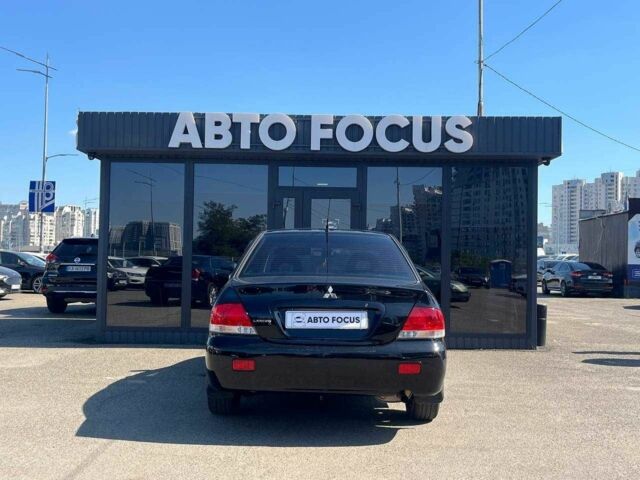 Чорний Міцубісі Lancer, об'ємом двигуна 2 л та пробігом 310 тис. км за 4990 $, фото 6 на Automoto.ua