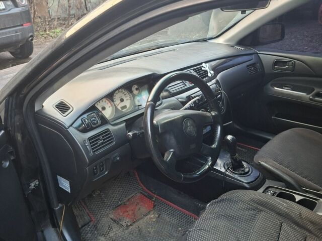 Чорний Міцубісі Lancer, об'ємом двигуна 1.6 л та пробігом 290 тис. км за 3800 $, фото 2 на Automoto.ua