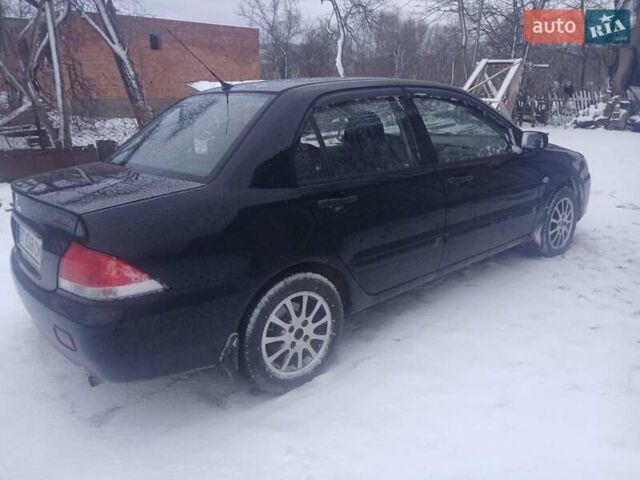 Чорний Міцубісі Lancer, об'ємом двигуна 1.6 л та пробігом 275 тис. км за 2999 $, фото 2 на Automoto.ua
