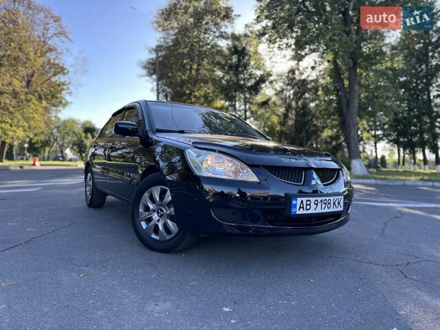 Мицубиси Лансер 2005 в Виннице на Automoto.ua Черный Мицубиси Лансер, объемом двигателя 1.6 л и пробегом 261 тыс. км за 4100 $, фото 19 на Automoto.ua