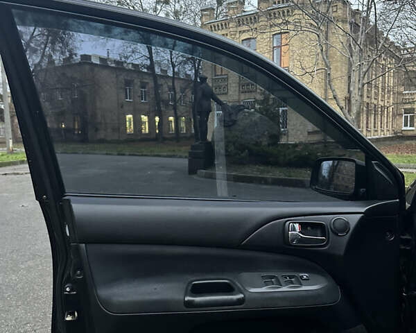 Чорний Міцубісі Lancer, об'ємом двигуна 2 л та пробігом 250 тис. км за 3999 $, фото 10 на Automoto.ua