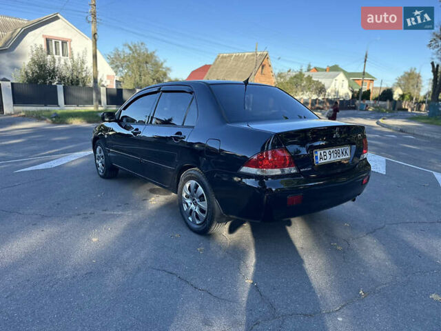 Мицубиси Лансер 2005 в Виннице на Automoto.ua Черный Мицубиси Лансер, объемом двигателя 1.6 л и пробегом 261 тыс. км за 4100 $, фото 29 на Automoto.ua